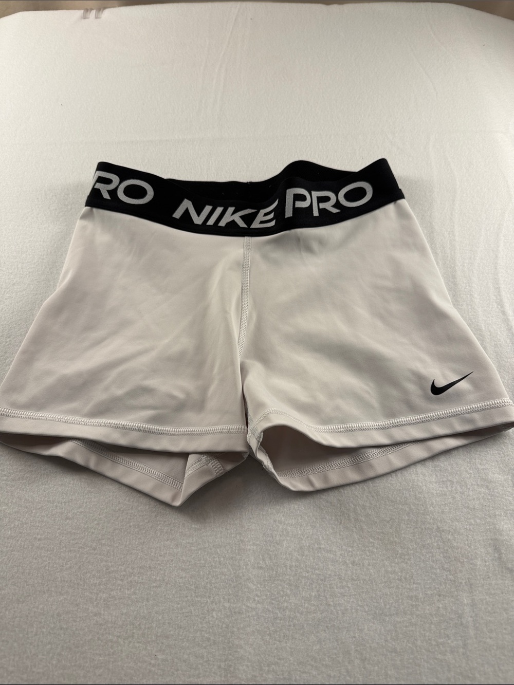 Nike Pro Women's White Athletic Shorts with Black Branded Waistband